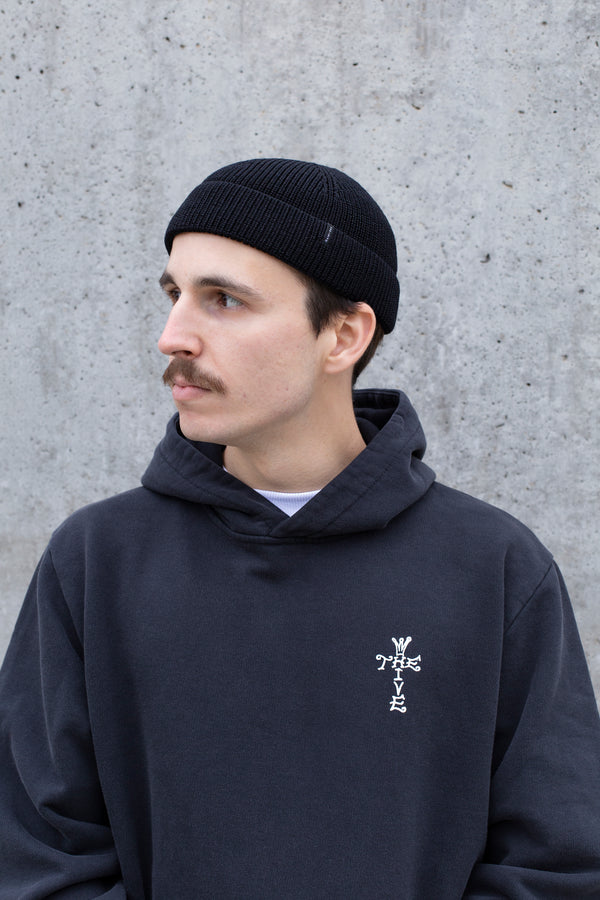 MERINO DOCKER SHORT BEANIE IN BLACK